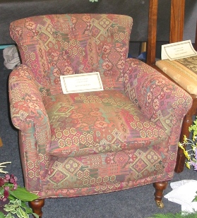 Traditional Victorian chair with feather cushion